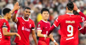 Liverpool's Wataru Endo, celebrates after scoring his side's second goal against Toulouse